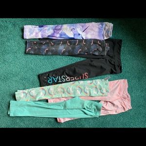 Lot of eight pairs of small leggings